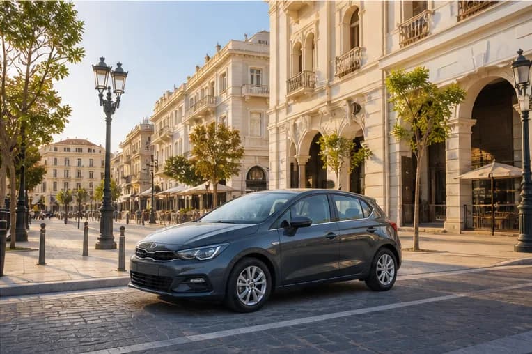 A compact rental car on a waterfront road in Thessaloniki
