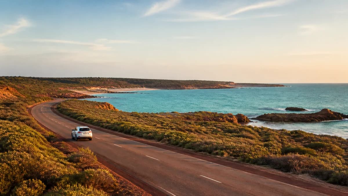 Rental SUV on a sealed Kimberley road near Broome
