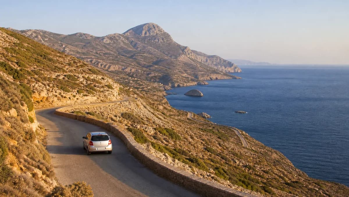Rental car on a coastal road near Karpathos Airport