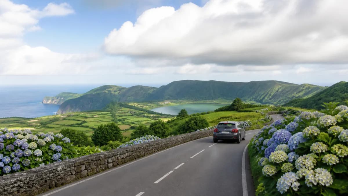 Rental car on a lush volcanic road on São Miguel in the Azores