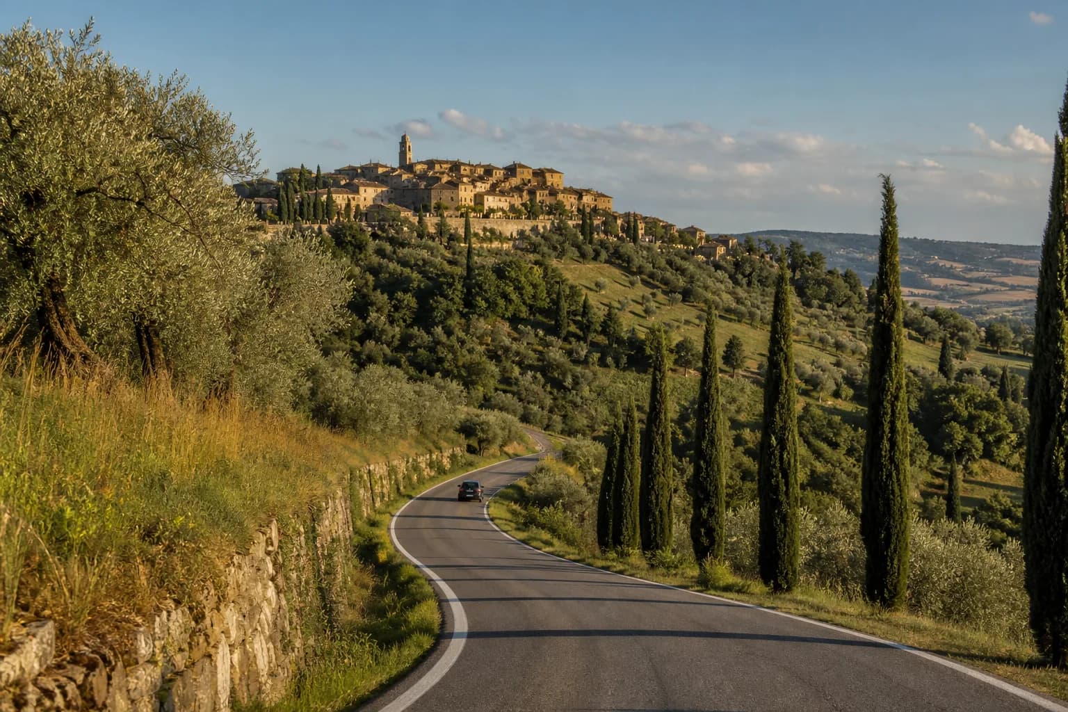 Rental car on a country road through the green hills outside Rome