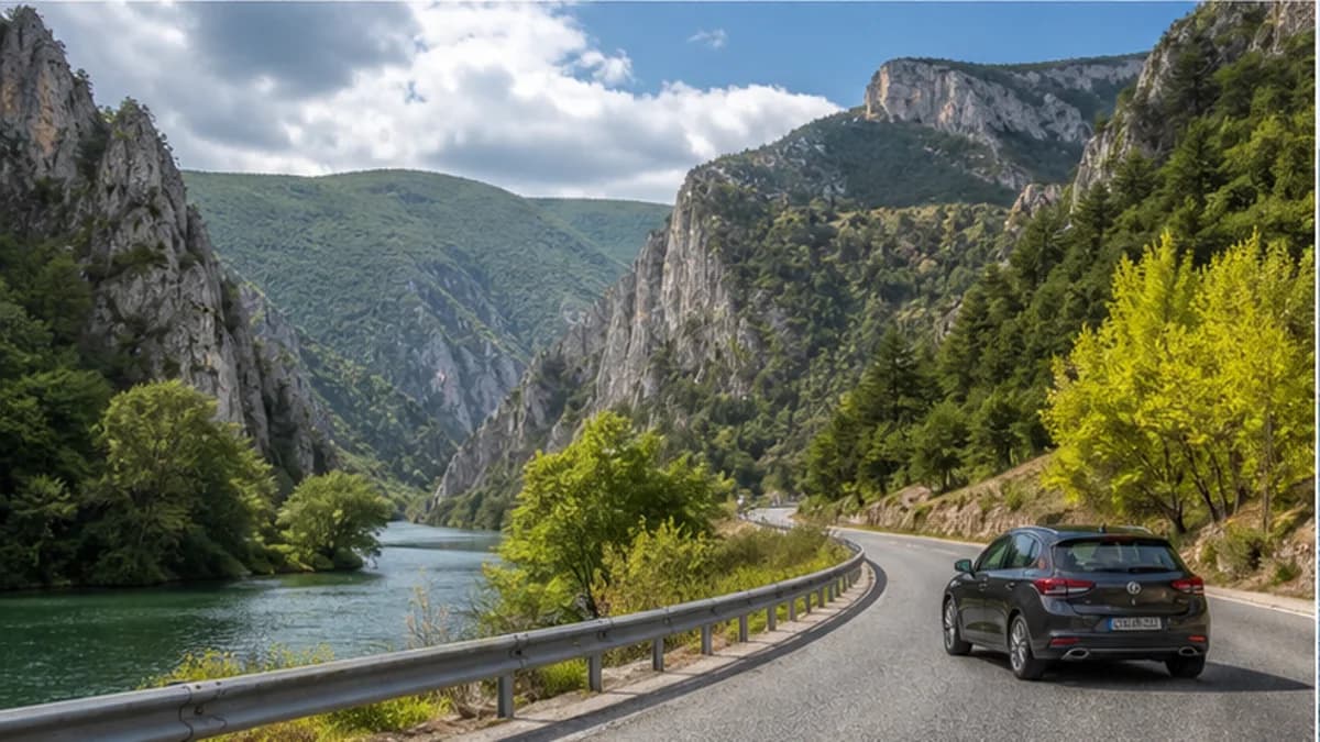 Rental car on a mountain-backed road outside Skopje in North Macedonia