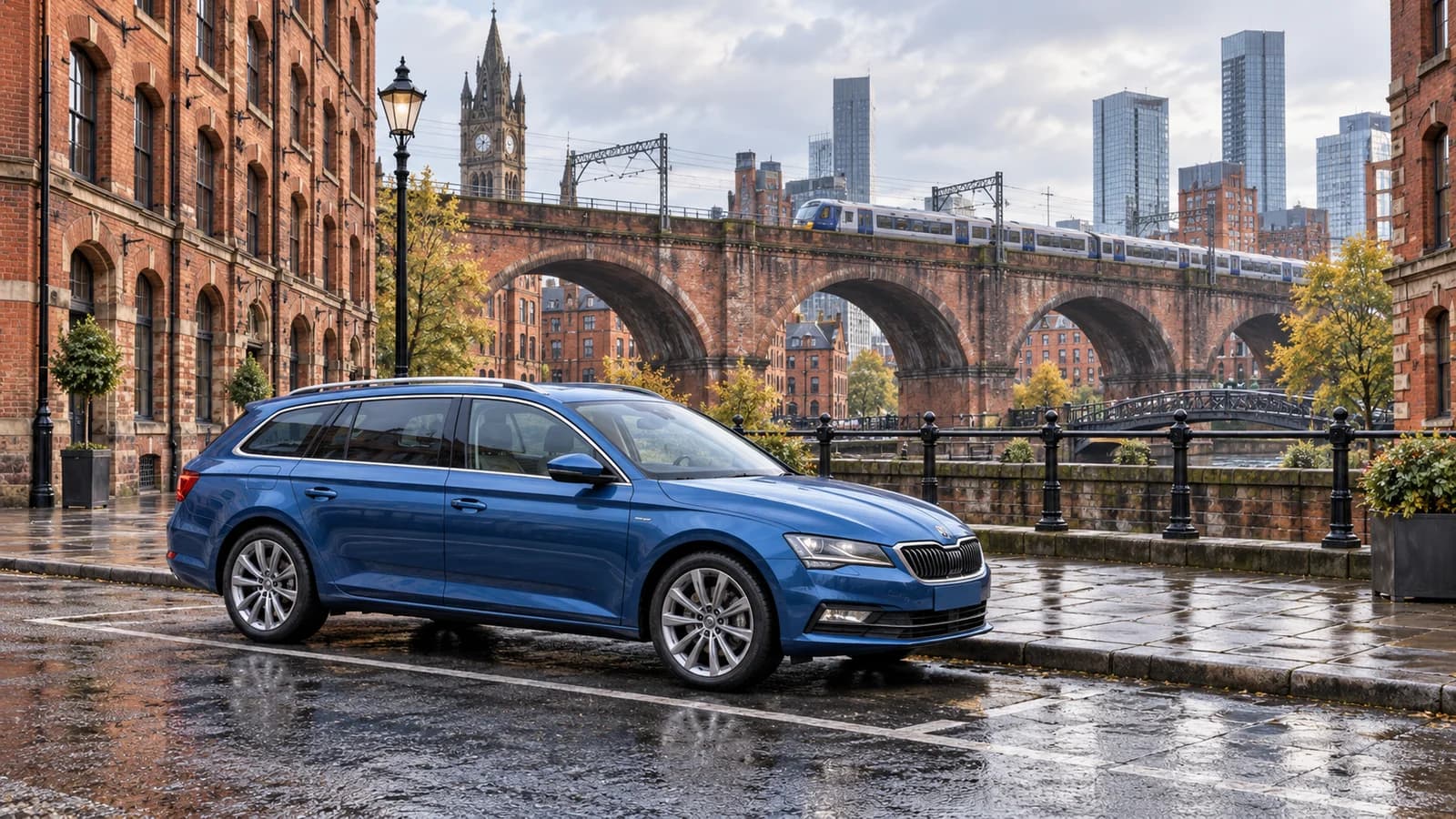 Manchester city travel illustration showing a blue rental estate car in a paved bay beside red brick warehouses and a railway viaduct.